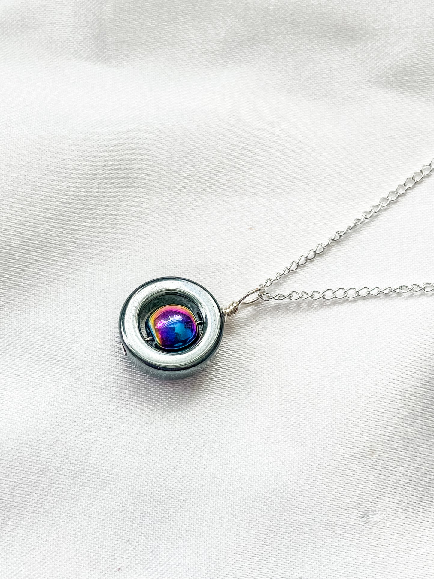 Hematite fidget spinner necklace